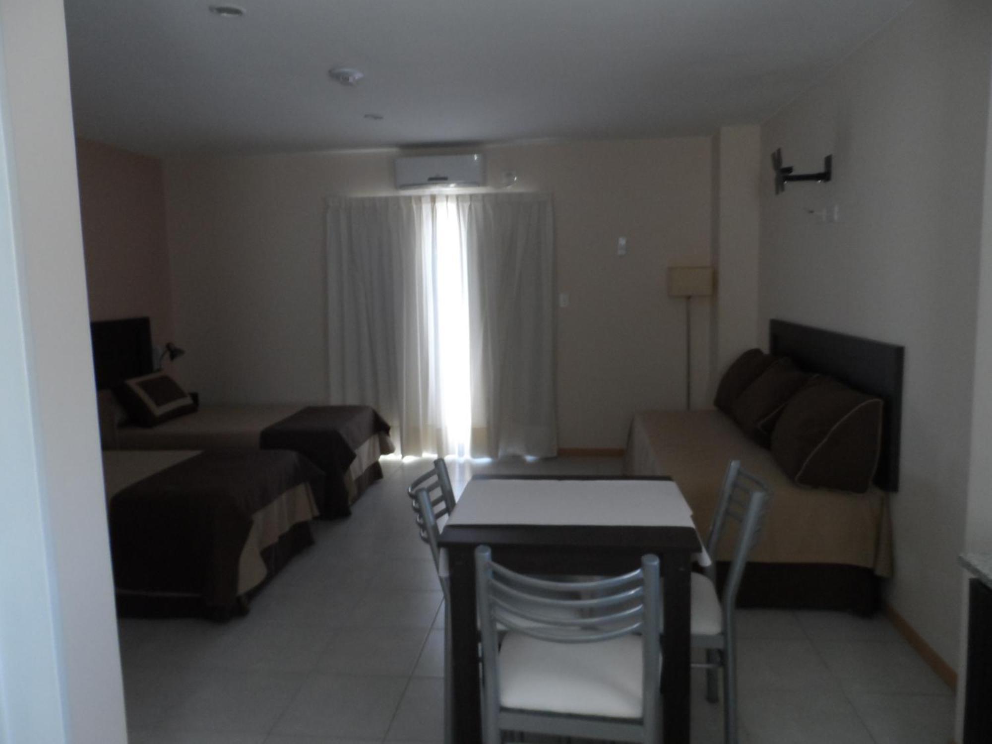 Apart Hotel Granada Neuquén Habitación foto