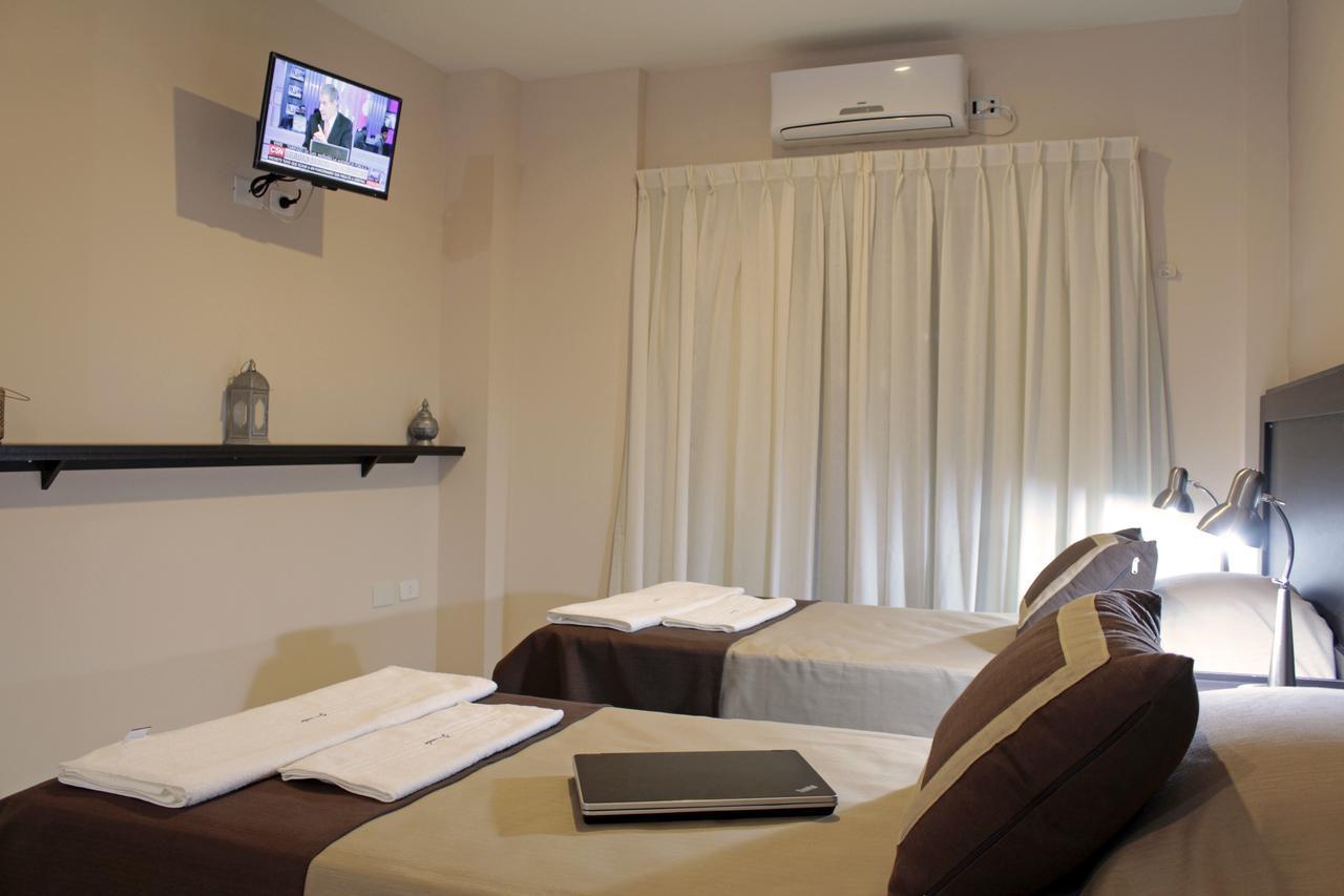 Apart Hotel Granada Neuquén Habitación foto
